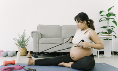 pregnant woman exercising. Exercising during pregnancy has many benefits.